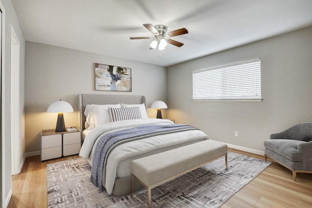 6603 Krollton Dr, Austin, TX 78745 - bedroom with wood finished floors, baseboards, and ceiling fan