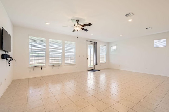 169 Slenderleaf Dr, Marble Falls, TX 78654 - empty room featuring ceiling fan, plenty of natural light, recessed lighting, light tile patterned flooring, and baseboards