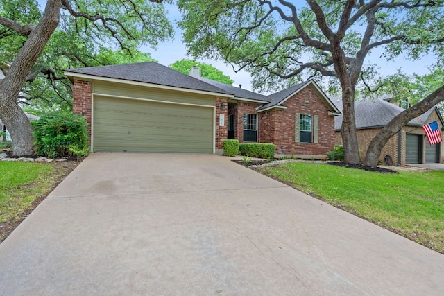 8104 Isaac Pryor Dr, Austin, TX 78749 - single story home with a garage, brick siding, a front lawn, and driveway