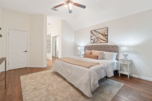 8104 Isaac Pryor Dr, Austin, TX 78749 - bedroom featuring hardwood / wood-style floors, baseboards, vaulted ceiling, and visible vents
