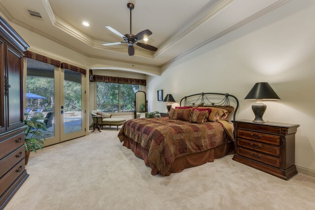 bedroom featuring light carpet, french doors, visible vents, and access to exterior