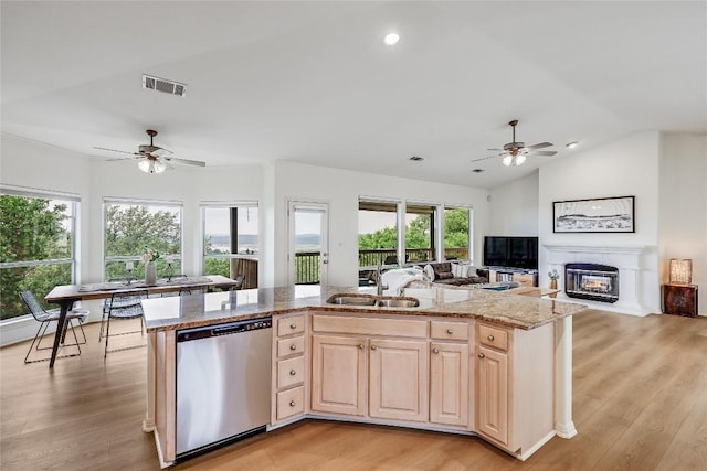 20718 Camel Back St, Lago Vista, TX 78645 - kitchen with dishwasher, a ceiling fan, a sink, light brown cabinetry, and recessed lighting