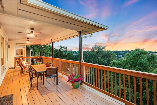 20718 Camel Back St, Lago Vista, TX 78645 - deck at dusk featuring outdoor dining space and ceiling fan
