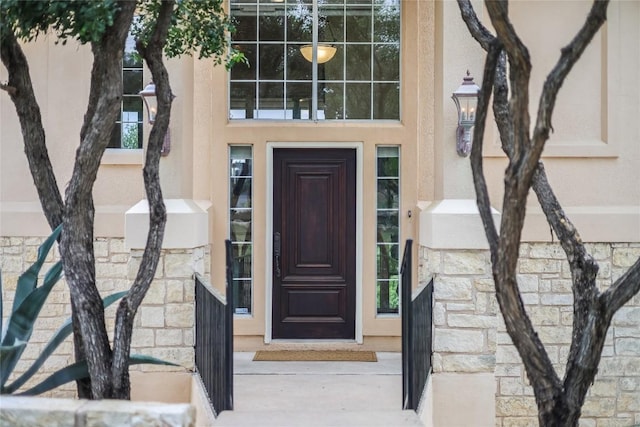 20718 Camel Back St, Lago Vista, TX 78645 - view of exterior entry featuring stucco siding and stone siding