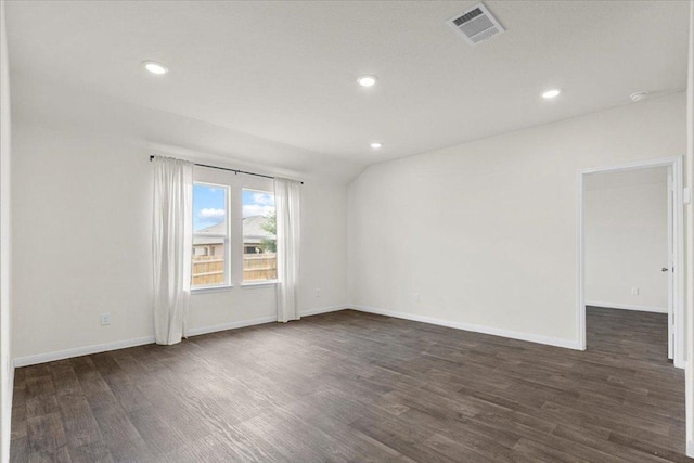 136 Medinah Ln, San Marcos, TX 78666 - unfurnished room featuring dark wood-style floors, baseboards, visible vents, and recessed lighting