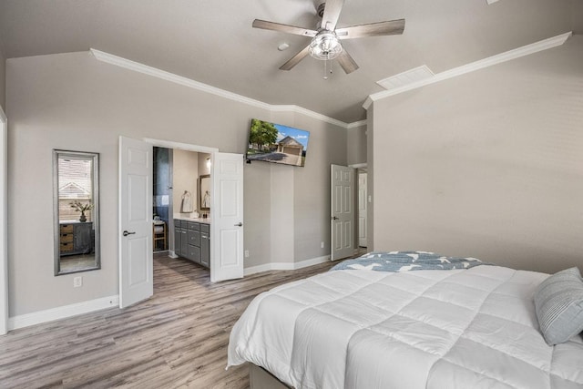 bedroom featuring baseboards, crown molding, light wood-style floors, and visible vents