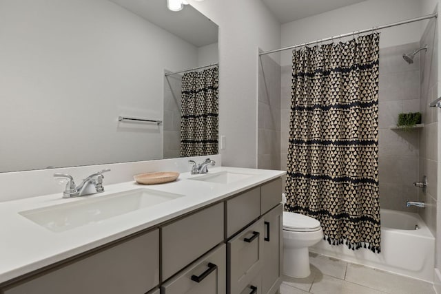 full bath featuring shower / tub combo, tile patterned floors, a sink, and toilet