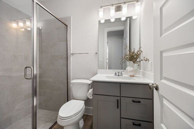 229 S Park Vis, Georgetown, TX 78628 - full bath featuring a stall shower, vanity, and toilet