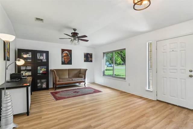 171 Calle Largo, Kyle, TX 78640 - entrance foyer with baseboards, ceiling fan, light wood-style flooring, and visible vents