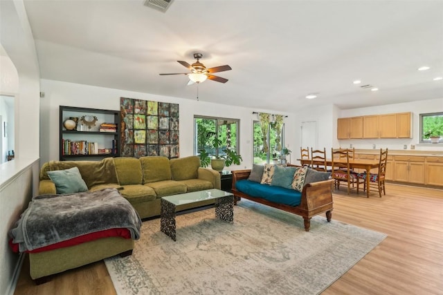 171 Calle Largo, Kyle, TX 78640 - living room featuring recessed lighting, ceiling fan, visible vents, and light wood-style flooring