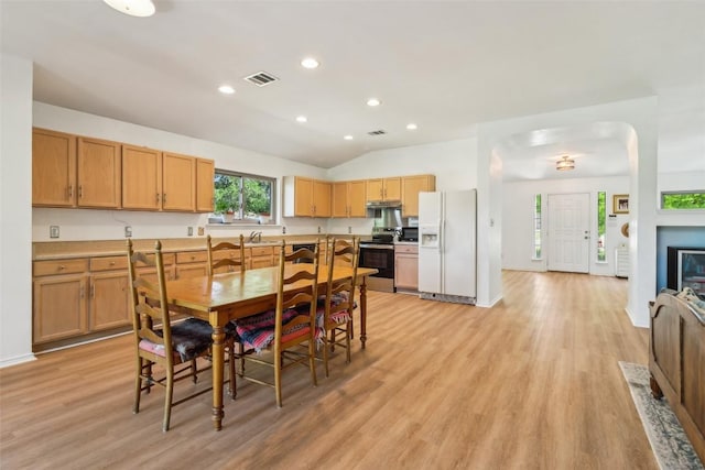 171 Calle Largo, Kyle, TX 78640 - dining area featuring visible vents, recessed lighting, light wood-style flooring, and lofted ceiling