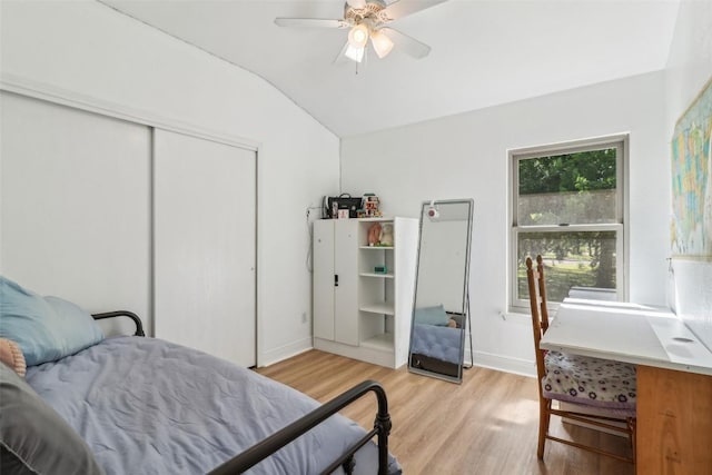 171 Calle Largo, Kyle, TX 78640 - bedroom featuring ceiling fan, light wood-style floors, baseboards, vaulted ceiling, and a closet