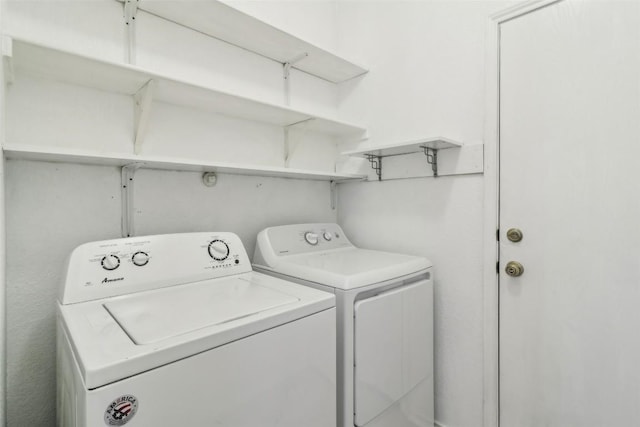 171 Calle Largo, Kyle, TX 78640 - laundry room with separate washer and dryer and laundry area