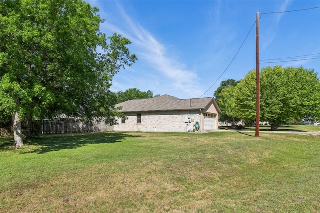 171 Calle Largo, Kyle, TX 78640 - view of yard featuring a garage and fence