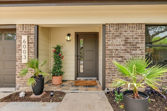 6003 Merriwood Dr, Austin, TX 78745 - doorway to property featuring brick siding