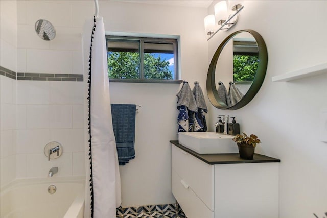 6003 Merriwood Dr, Austin, TX 78745 - full bath with shower / bathtub combination with curtain, vanity, and plenty of natural light