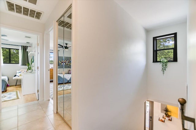 6003 Merriwood Dr, Austin, TX 78745 - hall featuring light tile patterned flooring