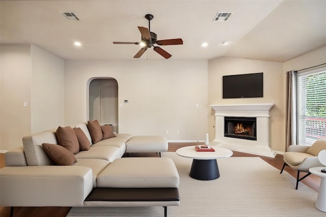 1124 Dyer Creek Pl, Round Rock, TX 78665 - living area featuring baseboards, ceiling fan, wood finished floors, a lit fireplace, and recessed lighting