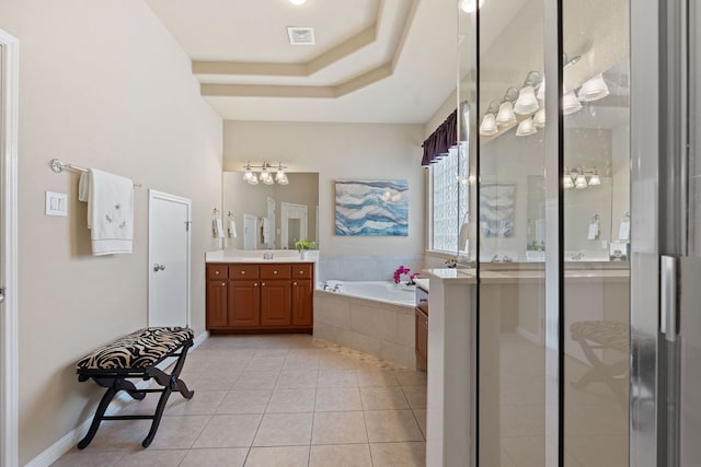 10033 Lisi Anne Dr, Austin, TX 78717 - full bath with vanity, tile patterned flooring, a garden tub, and a stall shower