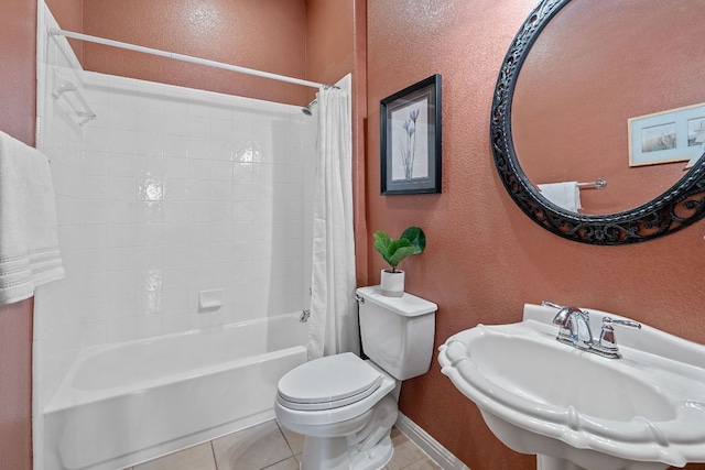 10033 Lisi Anne Dr, Austin, TX 78717 - bathroom featuring tile patterned flooring, shower / tub combo with curtain, and a textured wall