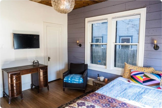 712 Harris Ave Unit 1, Austin, TX 78705 - bedroom with wooden walls and wood finished floors