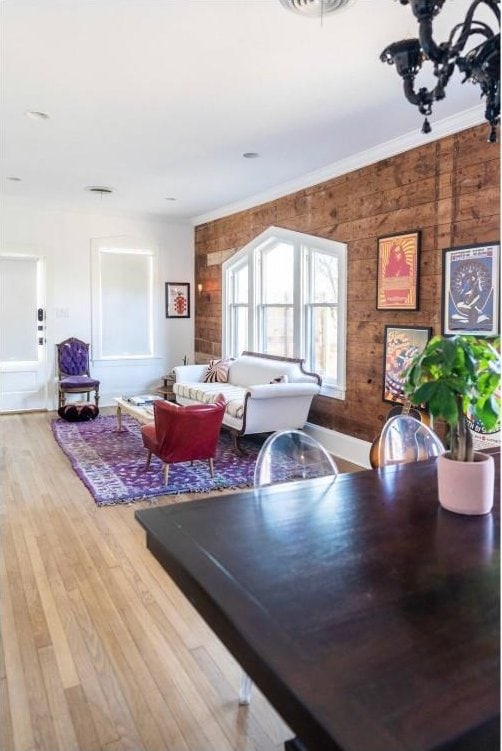 712 Harris Ave Unit 1, Austin, TX 78705 - dining room featuring wood finished floors and crown molding