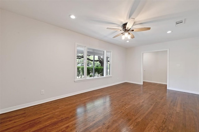 7611 Oak Hedge Pl, Austin, TX 78745 - empty room with a ceiling fan, baseboards, dark wood-style floors, and recessed lighting