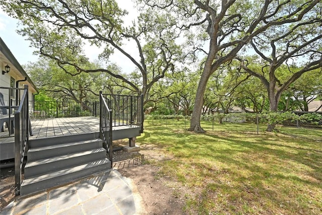 7611 Oak Hedge Pl, Austin, TX 78745 - view of grassy yard with a wooden deck