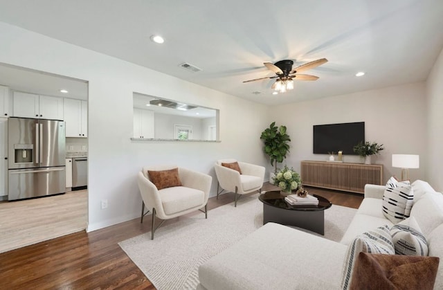 7611 Oak Hedge Pl, Austin, TX 78745 - living room featuring wood finished floors, a ceiling fan, recessed lighting, and baseboards