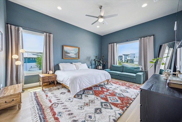 6229 Florencia Ln, Austin, TX 78724 - bedroom featuring wood finished floors, recessed lighting, and a ceiling fan
