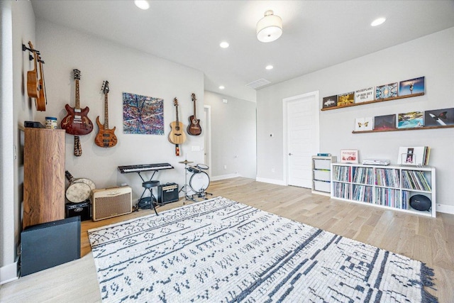 6229 Florencia Ln, Austin, TX 78724 - living area featuring wood finished floors and recessed lighting