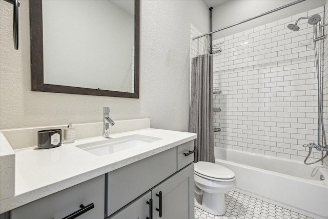 6229 Florencia Ln, Austin, TX 78724 - bathroom featuring vanity, shower / tub combo, a textured wall, and tile patterned floors