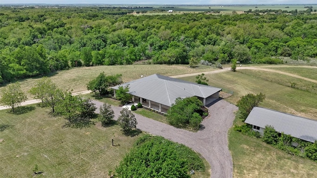 bird's eye view with a forest view