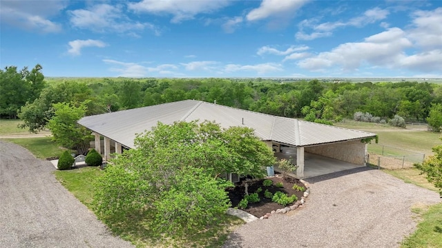 bird's eye view with a view of trees