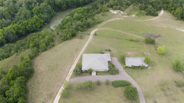 birds eye view of property with a rural view