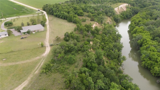 birds eye view of property with a water view and a rural view