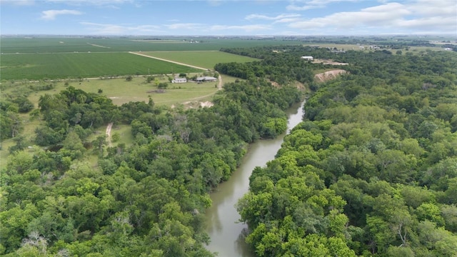 bird's eye view featuring a water view and a rural view