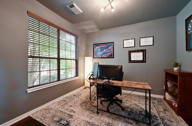 7716 Journeyville Dr, Austin, TX 78735 - home office with baseboards