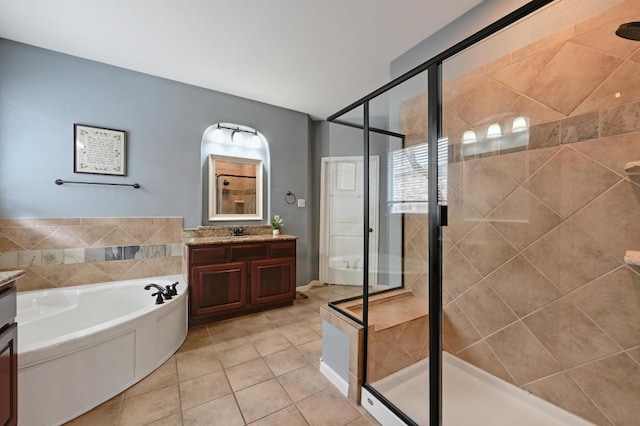 7716 Journeyville Dr, Austin, TX 78735 - bathroom featuring vanity, a shower stall, a bath, and tile patterned floors
