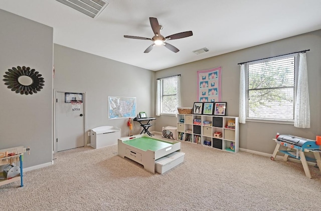 7716 Journeyville Dr, Austin, TX 78735 - rec room featuring carpet floors, a ceiling fan, and baseboards