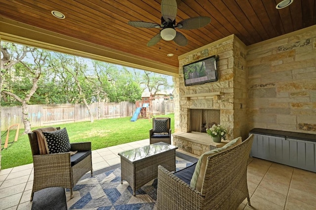 7716 Journeyville Dr, Austin, TX 78735 - view of patio / terrace with a playground, ceiling fan, and an outdoor living space with a fireplace