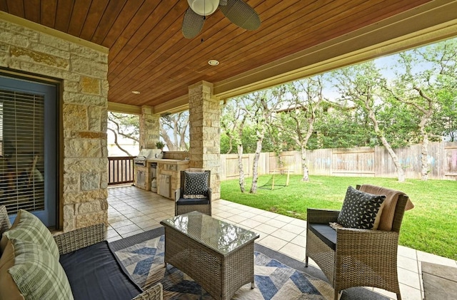 7716 Journeyville Dr, Austin, TX 78735 - view of patio featuring an outdoor kitchen and a ceiling fan