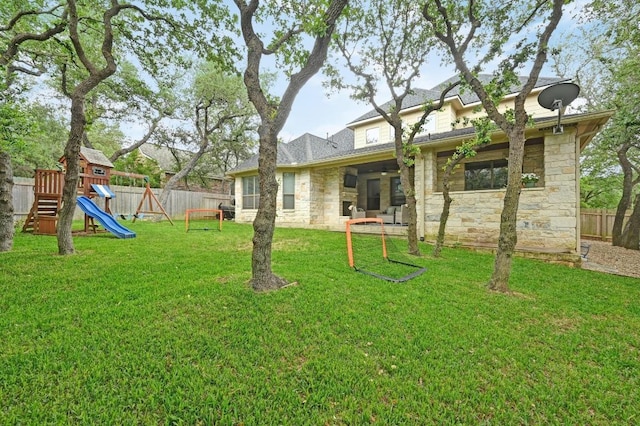 7716 Journeyville Dr, Austin, TX 78735 - fenced backyard featuring a playground