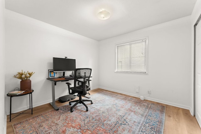 4302 Red Cloud Dr, Austin, TX 78759 - office with baseboards and wood finished floors