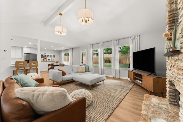 4302 Red Cloud Dr, Austin, TX 78759 - living area with light wood-style flooring and a chandelier