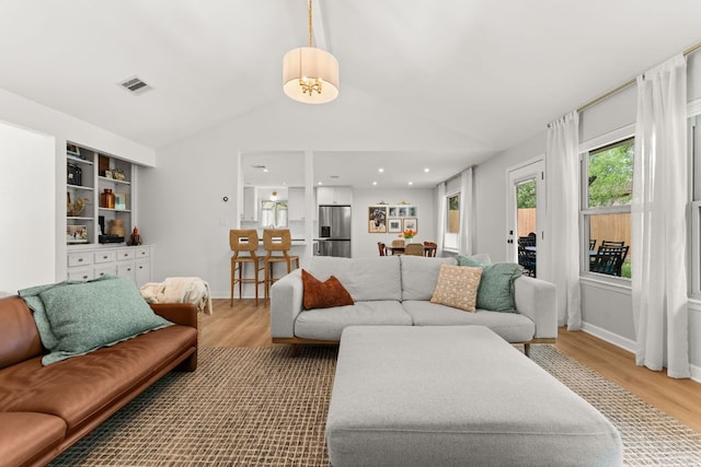 4302 Red Cloud Dr, Austin, TX 78759 - living area with wood finished floors and lofted ceiling