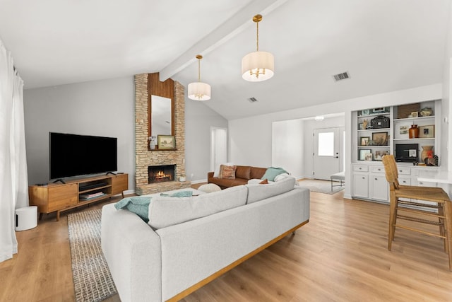 4302 Red Cloud Dr, Austin, TX 78759 - living area featuring light wood-type flooring and a fireplace