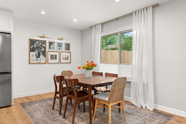 4302 Red Cloud Dr, Austin, TX 78759 - dining space with light wood finished floors, recessed lighting, and baseboards