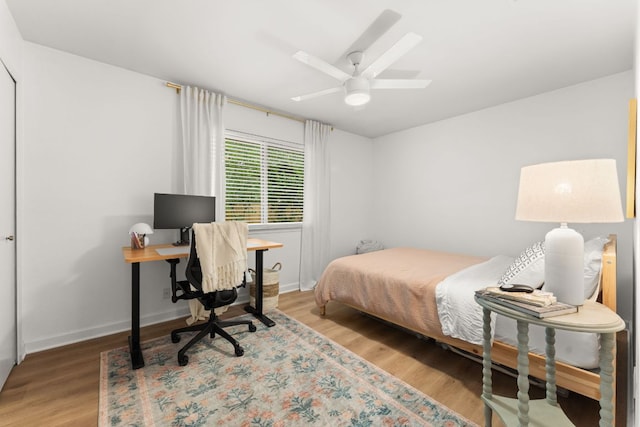 4302 Red Cloud Dr, Austin, TX 78759 - bedroom featuring wood finished floors, an office area, and ceiling fan
