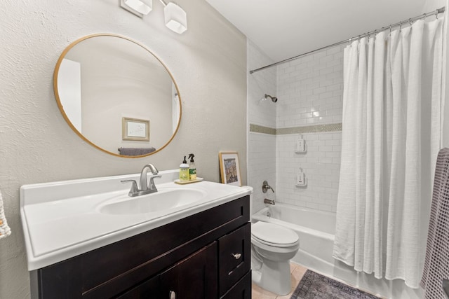 4302 Red Cloud Dr, Austin, TX 78759 - bathroom featuring toilet, vanity, shower / tub combo, and a textured wall